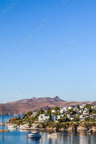 Fototapeta Naklejka Na Ścianę i Meble -  Blue sea, islands and boats on the Aegean coast. Summer vacation and coastal nature concept
