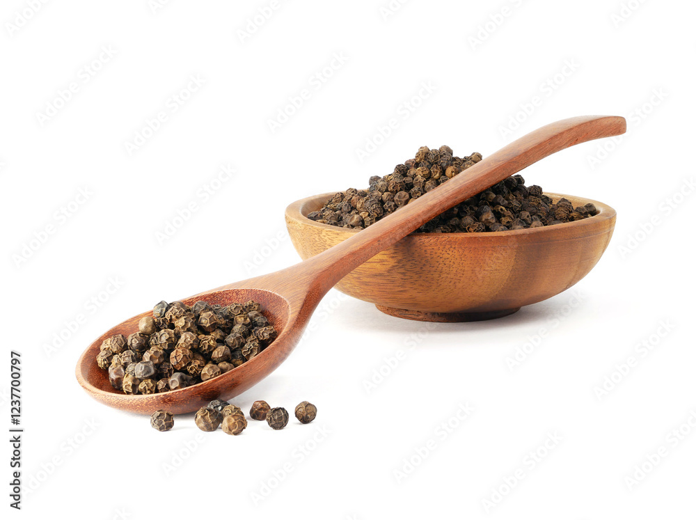 Black pepper in wooden spoon with bowl isolated on white background Black pepper in wooden spoon with bowl isolated on white background