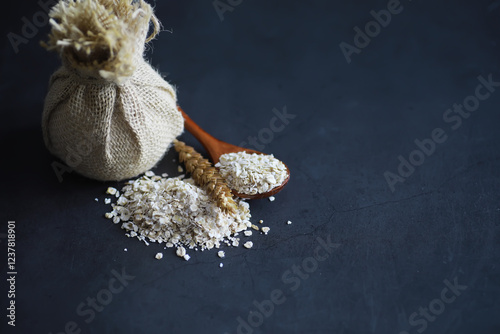 World grain crisis. A handful of cereals and on a dark background. photo