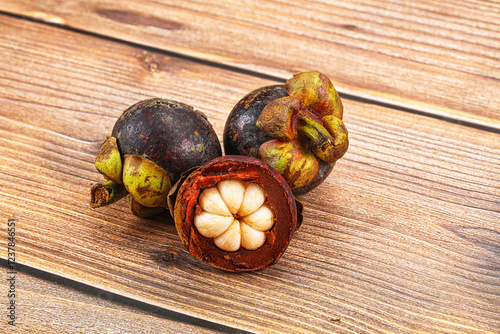 Sweet purple organic tropical mangosteen photo