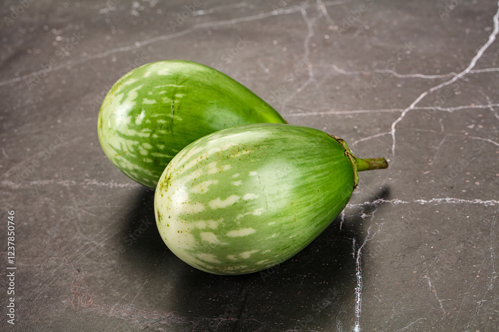 Ripe green mini eggplants heap Ripe green mini eggplants heap