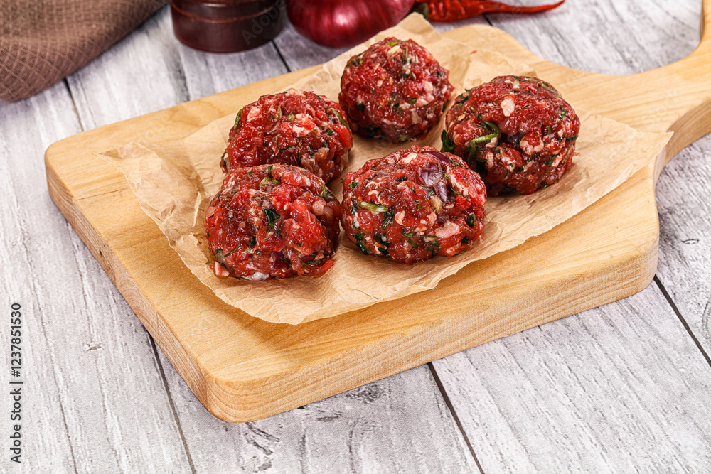 Raw beef meatballs for cooking Raw beef meatballs for cooking