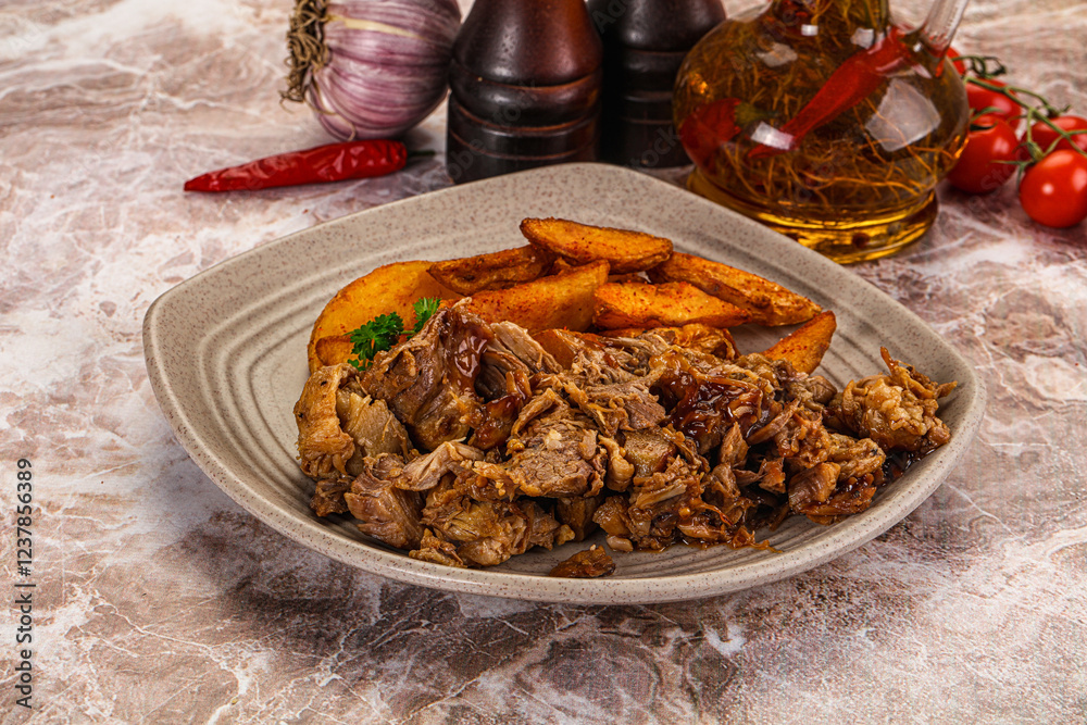 Fototapeta premium Baked shredded pork with potato