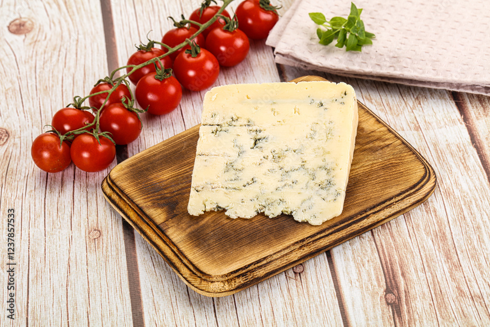 Blue cheese with mold over board