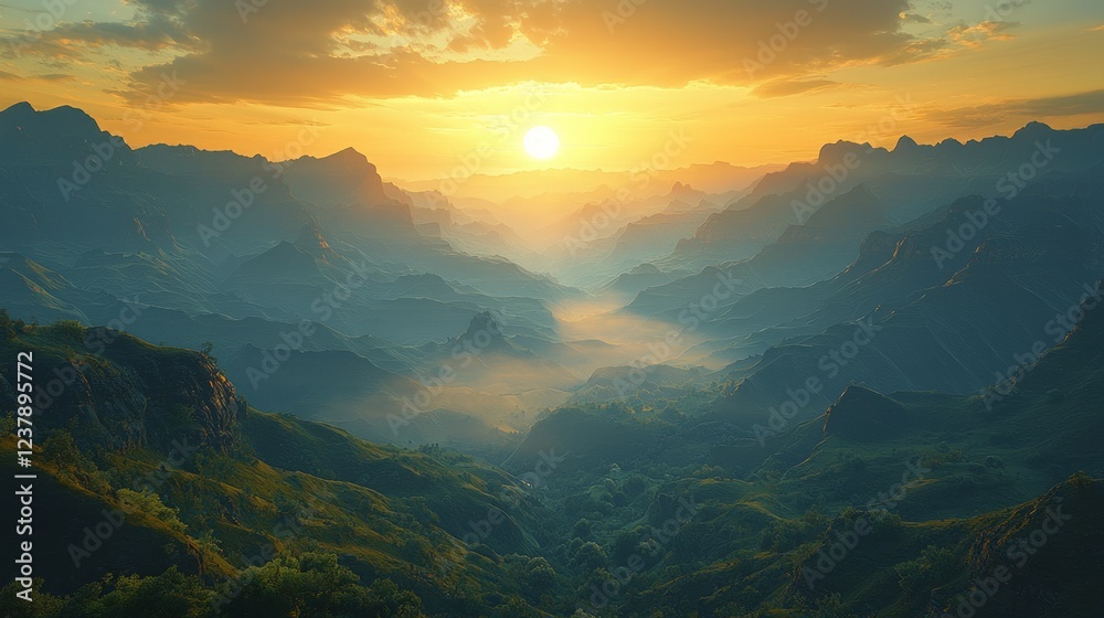Fototapeta premium Golden sunset over misty mountain valley