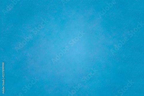 中心が明るいぼけたザラザラの深いターコイズブルーの背景