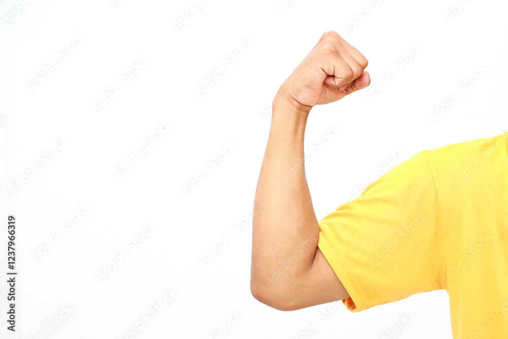 A male arm flexes its bicep muscle, displaying power and strength, on an isolated white background A male arm flexes its bicep muscle, displaying power and strength, on an isolated white background