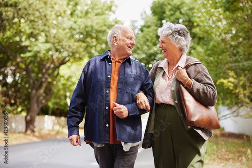 Happy elderly couple in love walking together outdoor