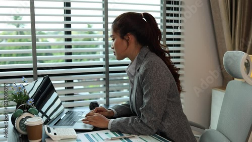 a businesswoman is working in her private office, the employee is working hard to meet the deadline set by her boss, a business owner is looking for ways to increase the profits of the company