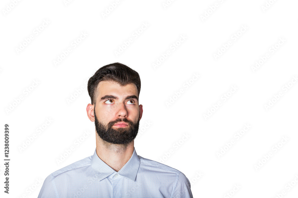 A close-up of a thoughtful bearded man in a light blue shirt looking upwards, isolated on a white background. Concept of ideas and contemplation A close-up of a thoughtful bearded man in a light blue shirt looking upwards, isolated on a white background. Concept of ideas and contemplation