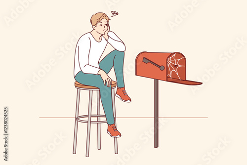 Lonely man waiting for letter, sitting by empty mailbox covered with cobwebs, wanting to receive messages from girlfriend. Lonely guy needs communication and suffers due to lack of friends