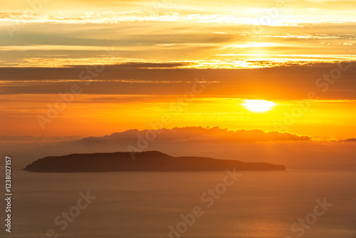 Fototapeta Naklejka Na Ścianę i Meble -  Island of Favignana in front of Trapani on Sicily during dramatic colourful sunset