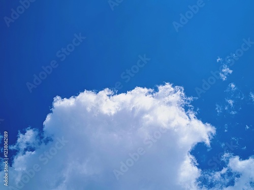 bright clouds in the blue sky, background