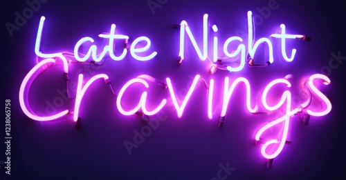 Neon light sign displaying Late Night Cravings in bold pink and purple hues glowing vibrantly against dark background with sleek curves and electric glow photo