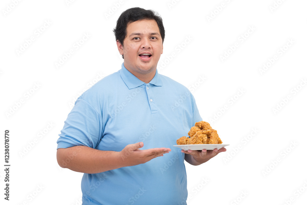 Portrait of a Fat asian man smiling holding a plate of fried chicken Portrait of a Fat asian man smiling holding a plate of fried chicken