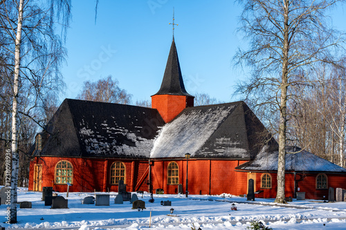 Red wooden Church in Hallefors Sweden a cold winters day photo