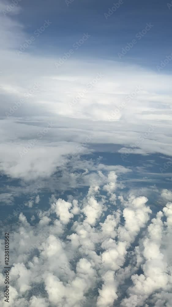 A simple and easy-to-understand name for the image could be Blue Sky with Clouds A simple and easy-to-understand name for the image could be Blue Sky with Clouds
