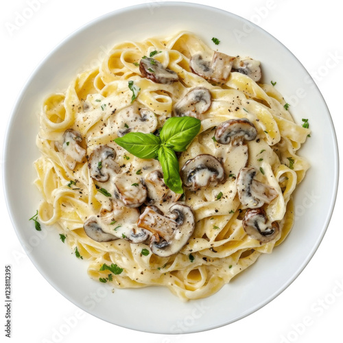 Creamy fettuccine pasta with sauteed mushrooms and fresh basil on a white plate, a delicious Italian dish, concept of gourmet food and fine dining