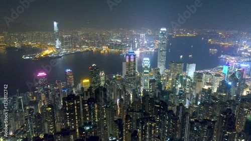 Wallpaper Mural HONG KONG, CHINA - FEBRUARY 2, 2025: Stunning view of Hong Kong skyline illuminated at night with vibrant lights and breathtaking cityscape Torontodigital.ca