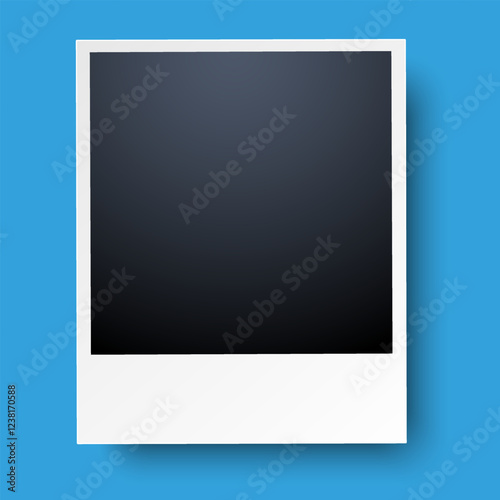 Blank classic Polaroid frame with a white frame on a bright background. Perfect for showcasing memories, creative projects or customisable content in photography and design.
