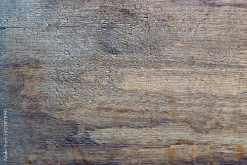 Obraz na płótnie The old wooden plank is weathered, cracked, and rough. w salonie