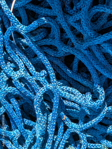 Close up of industrial blue construction rope thick and abstract