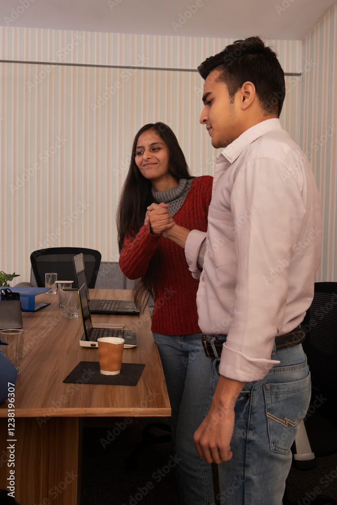 Two business people shaking hands after successful business meeting Two business people shaking hands after successful business meeting