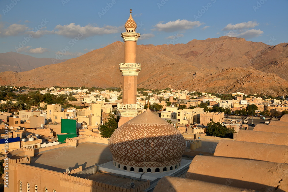 The Nizwa Mosque and the city of Nizwa viewed from the top of the Nizwa fort, Nizwa, Al Dakhiliyah, Oman