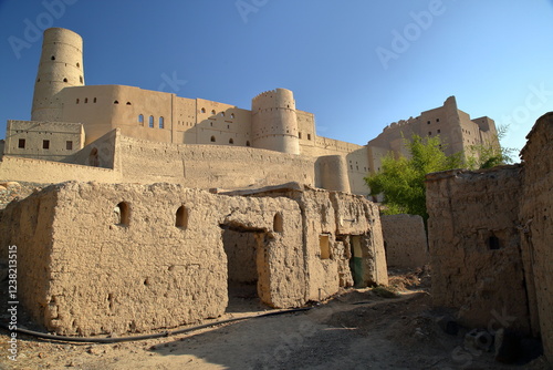 The impressive Bahla fort in Bahla, Al Dakhiliyah, Oman, with its towers and ramparts photo