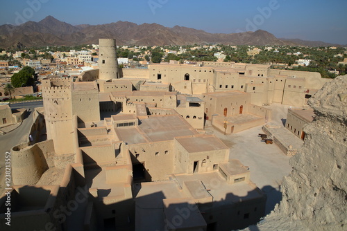 The impressive Bahla fort in Bahla, Al Dakhiliyah, Oman, with its towers and ramparts photo