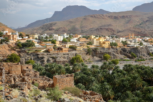 Obraz na płótnie Ghul village, located 12 km west of Al Hamra and on the road to Jebel Shams, Al Dakhiliyah, Oman, with the ruins of the abandoned old Ghul village in the foreground w salonie
