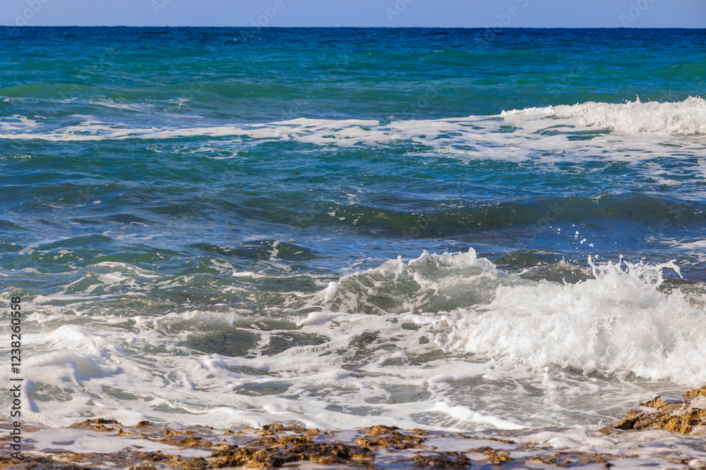 rocky coastline with crashing waves on the island of Cyprus near the city of Paphos in Greece in November rocky coastline with crashing waves on the island of Cyprus near the city of Paphos in Greece in November
