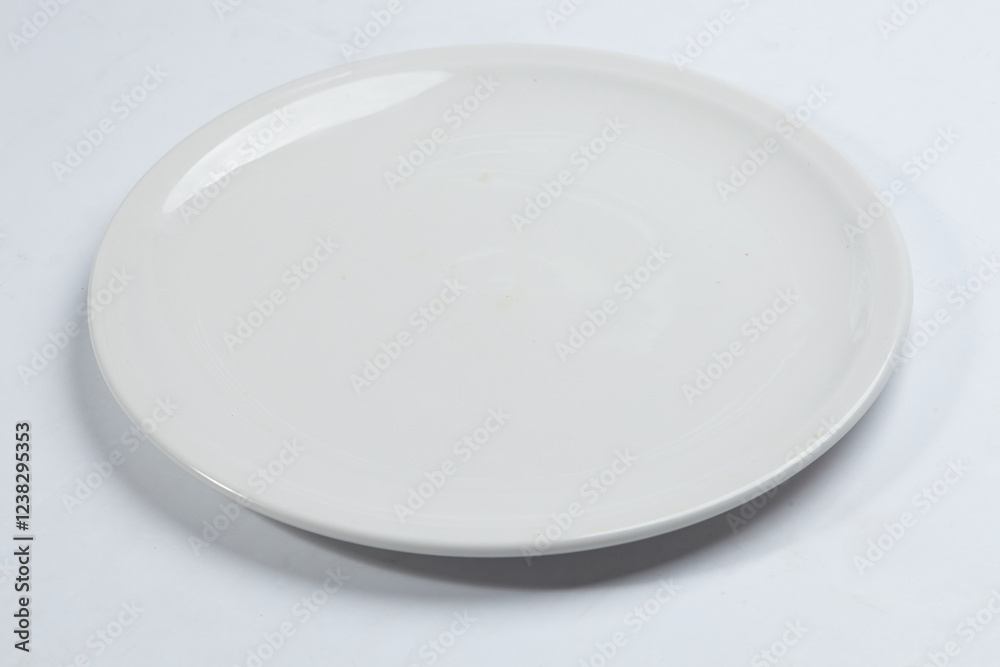 empty plate on the white background empty plate on the white background