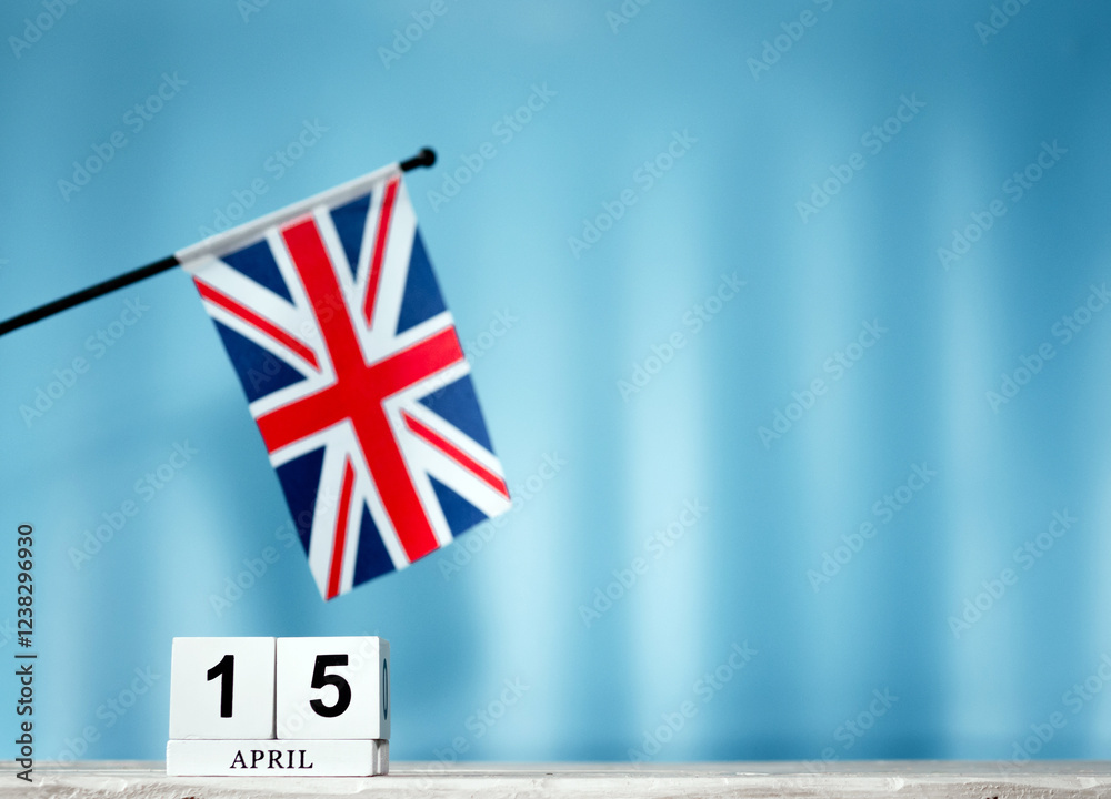 Fototapeta premium April Calendar With British Flag With Number 15. Calendar cubes with numbers. Space copy.