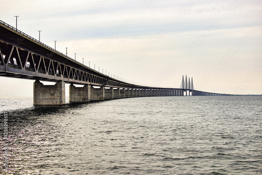 Oresund Bridge view from Swedish coast during the sunset. Oresund Bridge view from Swedish coast during the sunset.