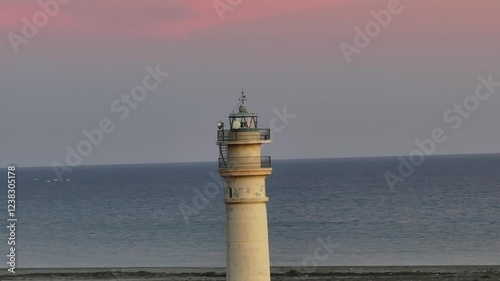 El faro de Sabinal situado en la reserva natural de Punta Entinas-Sabinar, municipio El Ejido, provincia de Almería, Andalucía, España. photo