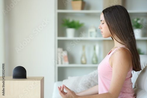 Free Download Woman doing yoga with smart speaker - GFXLoad