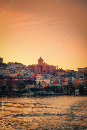 sunset over the colorful block of city