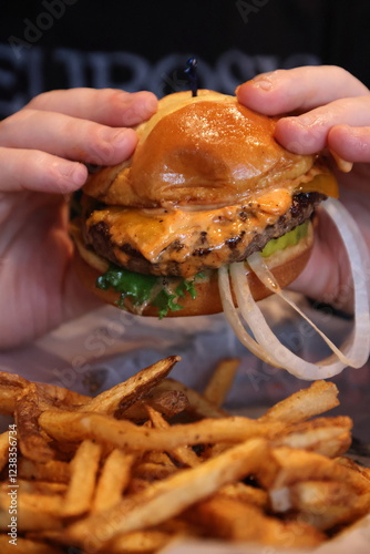 Big, gooey cheeseburger at a restaurant in Columbus, Ohio.