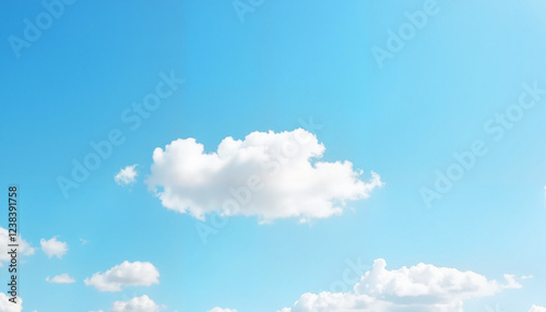 Serene blue sky with fluffy clouds on a summer day, uplifting ambiance