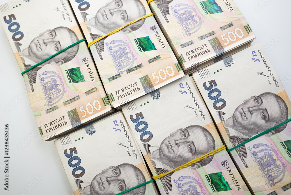 Ukraine money 500 hryvnia on white. Ukrainian finances, salary, pension, donations, taxes. Stacks of five hundred hryvnia. Ukraine money 500 hryvnia on white. Ukrainian finances, salary, pension, donations, taxes. Stacks of five hundred hryvnia.
