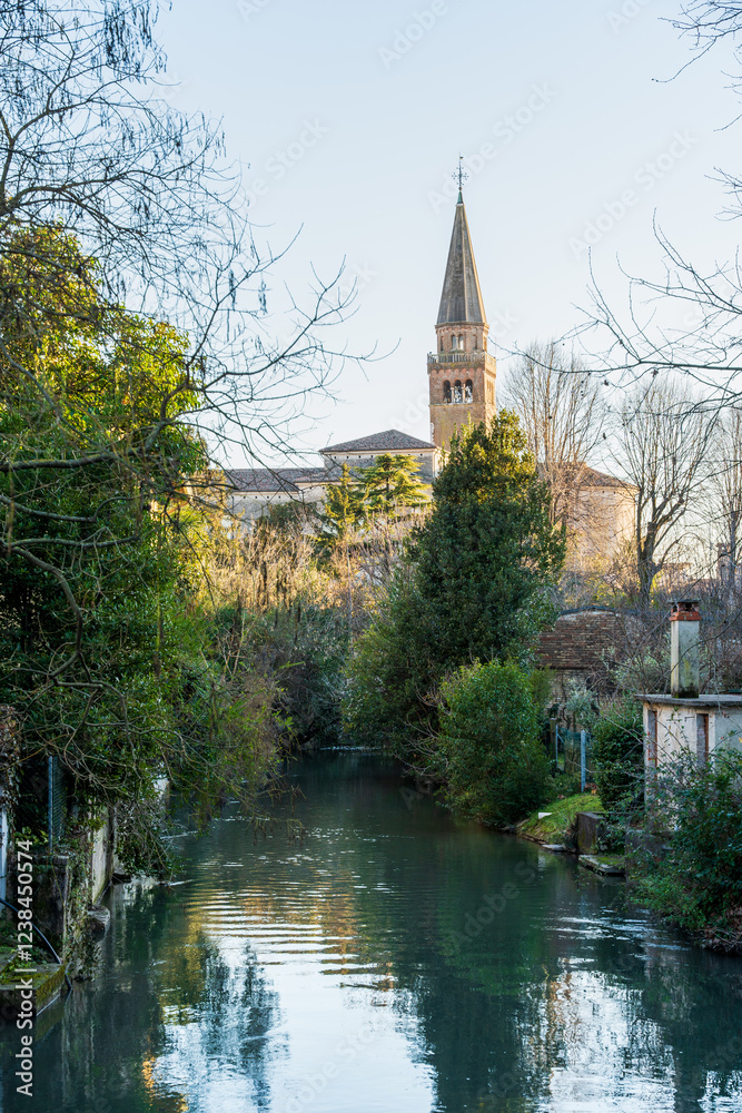view of the bell tower in the historic center of Portogruaro, Veneto, Italy view of the bell tower in the historic center of Portogruaro, Veneto, Italy