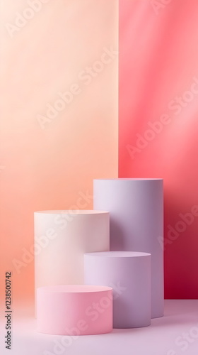A set of minimalist cylindrical product podiums in pastel colors with a vertical striped background for a clean product display.