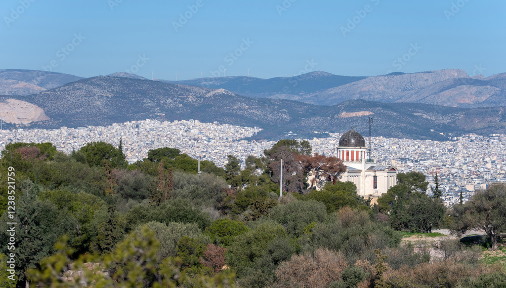 Obraz premium Athens, Greece. National observatory building up on the hill, blue sky
