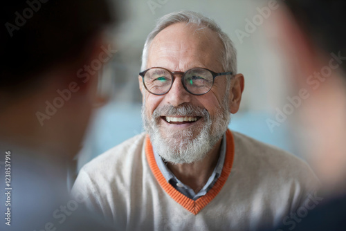 Man psychotherapist talks to a married couple.