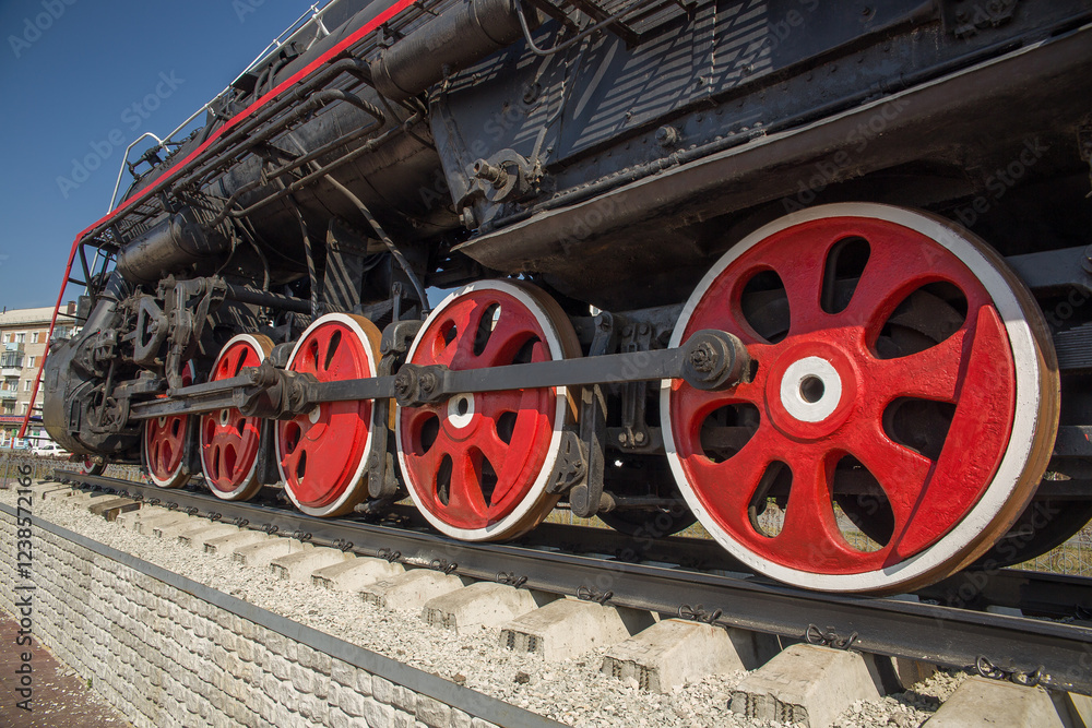 Wheels of an old locomotive. Chassis of a steam locomotive. Wheels of an old locomotive. Chassis of a steam locomotive.