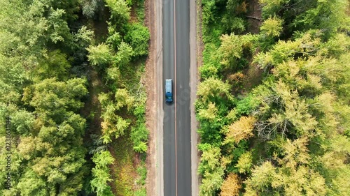 Aerial view of car driving. Road trip. 