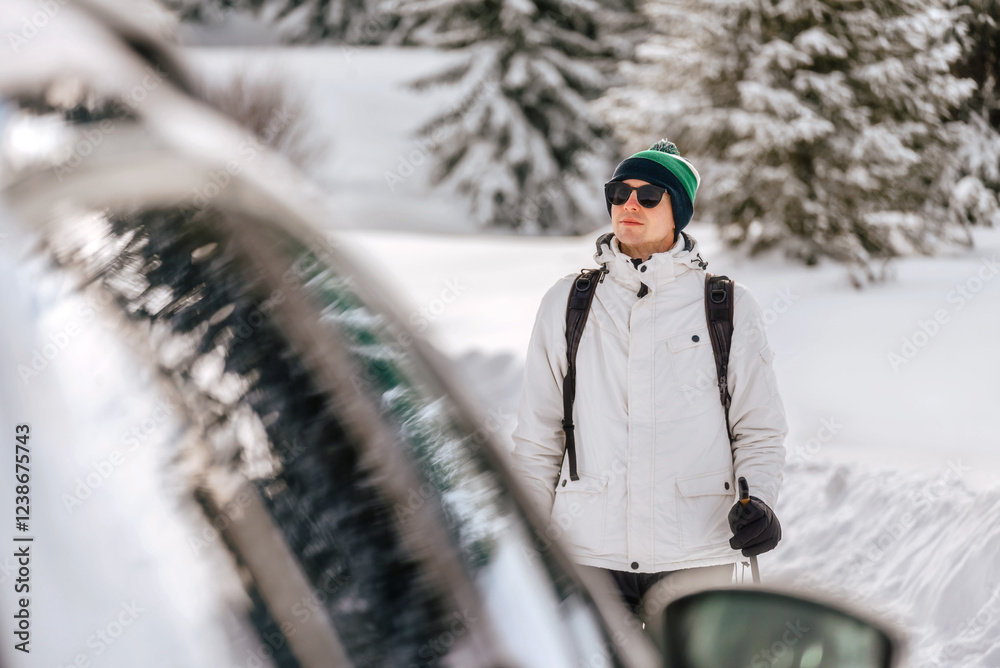 Man Hiker Walking to Car in Winter Forest
