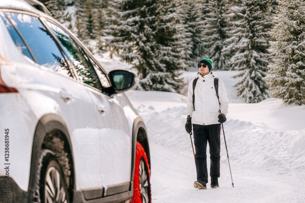 Man Traveler Walking to Car in Winter Forest