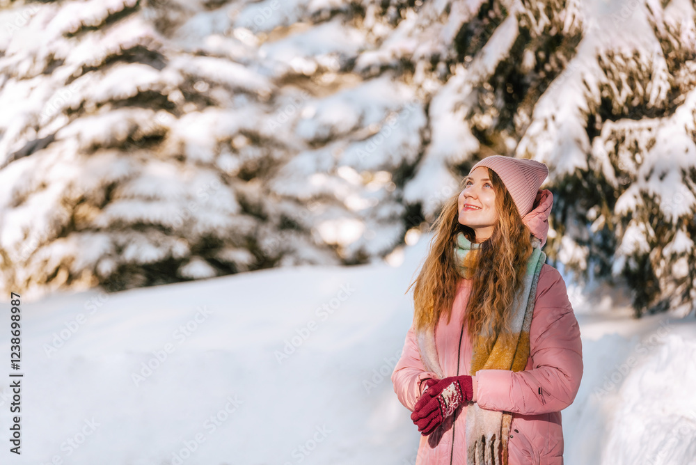 Smiling Woman Enjoying Walk in Winter Forest
